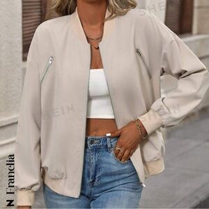 Cream colored bomber